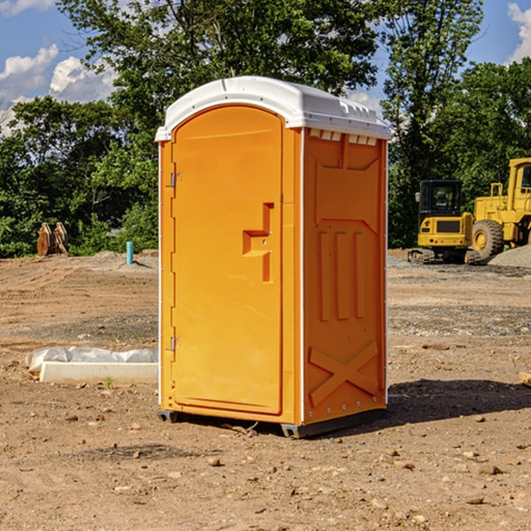 what is the cost difference between standard and deluxe portable restroom rentals in Harold